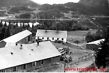 Vest for gårdstunet på Lo i Åsenfjord (Åsen), nå Levanger kommune. Lofjorden i bakgrunnen
